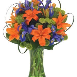Orange lilies are arranged in a clear glass vase with purple statice and yellow solidago