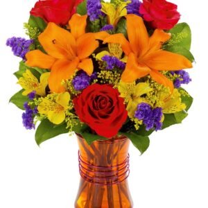 Bi-color roses, orange lilies, purple statice, solidago in a purple glass vase